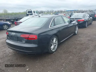 2016 Audi A8 L 4.0T Sport with VIN WAU43AFD3GN020763, listed as a IAAI auction lot 41951858 with 104,563 mi miles. Bid and sale history available at carsss.com. Image 4.