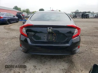 2017 Honda Civic LX z VIN 2HGFC2F55HH030250, wystawiony jako Copart lot #59228905 z przebiegiem 148 692 mil mil oraz Szkoda całkowita • Salvage title. Historia ofert i sprzedaży dostępna na DreamBid. Obrazek 6.
