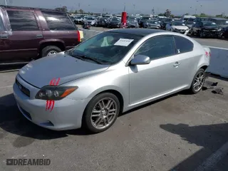 2010 Scion tC with VIN JTKDE3B77A0309005, listed as a IAAI auction lot 41685490 with 153,319 mi miles. Bid and sale history available at carsss.com. Image 2.