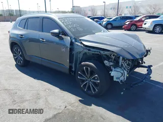 2024 Mazda CX-50 Premium Plus with VIN 7MMVABEY2RN195046, listed as a IAAI auction lot 41228483 with 11,030 mi miles and . Bid and sale history available at DreamBid. Image 1.