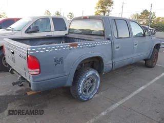 2000 Dodge Dakota Sport with VIN 1B7GG2AN7YS624989, listed as a IAAI auction lot 40820872 with Not Provided miles and . Bid and sale history available at carsss.com. Image 4.