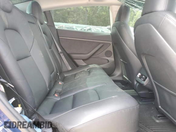 2023 Tesla Model 3 z VIN 5YJ3E1EA6PF692248, wystawiony jako Copart lot #58831805 z przebiegiem 18 607 mil mil oraz Szkoda całkowita • Salvage title. Historia ofert i sprzedaży dostępna na DreamBid. Obrazek 10.