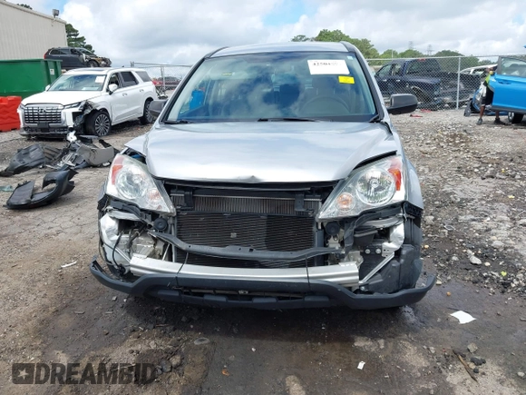 2010 Honda CR-V LX with VIN 5J6RE3H35AL022742, listed as a IAAI auction lot 42504890 with 68,179 mi miles and . Bid and sale history available at DreamBid. Image 6.