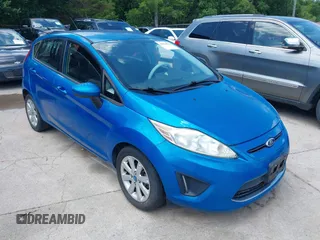 2012 Ford Fiesta SE z VIN 3FADP4EJ2CM221032, wystawiony jako IAAI lot #42462926 z przebiegiem 110 787 mil mil oraz . Historia ofert i sprzedaży dostępna na DreamBid. Obrazek 1.