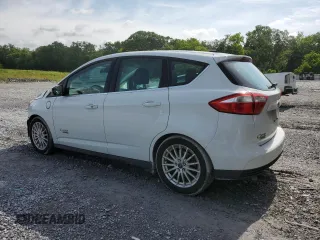 2015 Ford C-Max Energi SEL with VIN 1FADP5CU4FL115268, listed as a Copart auction lot 56919244 with 80,712 mi miles and Salvage Title. Bid and sale history available at carsss.com. Image 2.