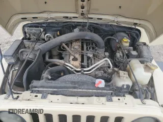 2001 Jeep Wrangler Sport с VIN 1J4FA49S71P312113, выставлен на аукционе Copart как лот 51168125 с пробегом 120 683 миль миль и Списание • Salvage title. История ставок и продаж доступна на DreamBid. Изображение 12.
