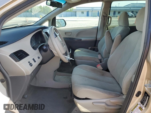 2012 Toyota Sienna with VIN 5TDKA3DC3CS011118, listed as a Copart auction lot 52087475 with 208,146 mi miles and Salvage Title. Bid and sale history available at DreamBid. Image 7.