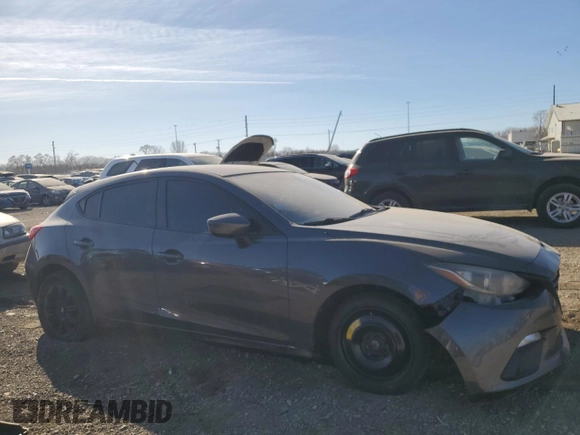 2014 Mazda 3 i Sport with VIN JM1BM1K7XE1186810, listed as a Copart auction lot 42239495 with 136,947 mi miles and Salvage Title. Bid and sale history available at DreamBid. Image 4.