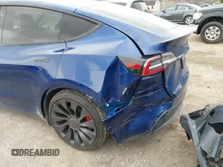 2020 Tesla Model Y Long Range with VIN 5YJYGDEF0LF000380, listed as a IAAI auction lot 41867489 with 66,294 mi miles and . Bid and sale history available at DreamBid. Image 6.