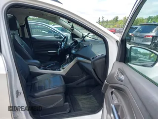 2013 Ford Escape SEL z VIN 1FMCU9HX1DUA51248, wystawiony jako IAAI lot #42185187 z przebiegiem 123 845 mil mil oraz . Historia ofert i sprzedaży dostępna na DreamBid. Obrazek 5.