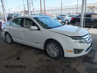 2012 Ford Fusion Hybrid с VIN 3FADP0L34CR187546, выставлен на аукционе IAAI как лот 42228692 с пробегом 90 507 миль миль и . История ставок и продаж доступна на DreamBid. Изображение 1.