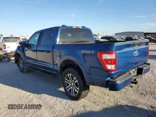 2023 Ford F-150 XL with VIN 1FTFW1E51PKF30933, listed as a Copart auction lot 76121834 with 26,267 mi miles and Salvage Title. Bid and sale history available at carsss.com. Image 2.