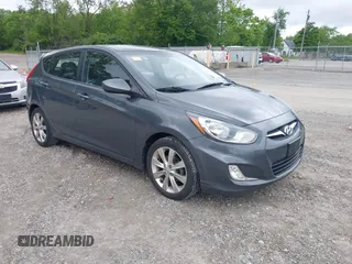 2012 Hyundai Accent SE z VIN KMHCU5AE3CU006411, wystawiony jako IAAI lot #42329689 z przebiegiem 101 290 mil mil oraz . Historia ofert i sprzedaży dostępna na DreamBid. Obrazek 1.