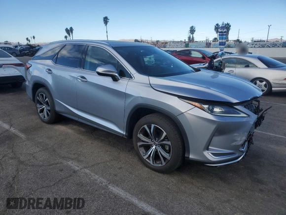 2022 Lexus RX with VIN JTJHZKEA0N2024877, listed as a Copart auction lot 41654965 with 14,003 mi miles and Salvage Title. Bid and sale history available at carsss.com. Image 4.