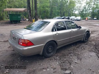 2002 Acura RL with VIN JH4KA96682C009762, listed as a IAAI auction lot 42450219 with 207,765 mi miles and . Bid and sale history available at DreamBid. Image 4.