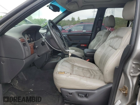 2001 Jeep Grand Cherokee Limited with VIN 1J4GW58N91C653866, listed as a Copart auction lot 58546895 with 159,661 mi miles and Salvage title. Bid and sale history available at DreamBid. Image 7.