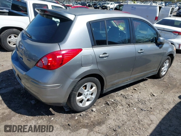 2012 Nissan Versa S with VIN 3N1BC1CP0CK206613, listed as a IAAI auction lot 41836647 with 180,698 mi miles. Bid and sale history available at carsss.com. Image 4.