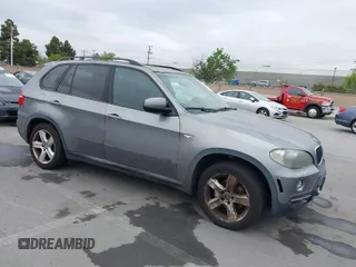 2008 BMW X5 3.0si with VIN 5UXFE43578L023973, listed as a IAAI auction lot 42014068 with 140,752 mi miles. Bid and sale history available at carsss.com. Image 1.