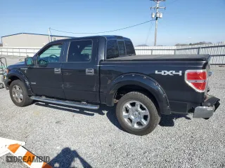 2013 Ford F-150 XL with VIN 1FTFW1ET5DFD19527, listed as a Copart auction lot 48721575 with 130,984 mi miles and Salvage Title. Bid and sale history available at carsss.com. Image 2.