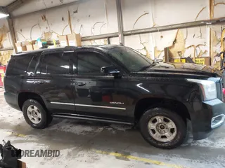 2015 GMC Yukon Denali with VIN 1GKS2CKJ4FR173703, listed as a IAAI auction lot 41943537 with 167,834 mi miles. Bid and sale history available at carsss.com. Image 13.