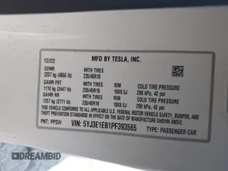 2023 Tesla Model 3 Long Range with VIN 5YJ3E1EB1PF393565, listed as a IAAI auction lot 41656060 with 16,236 mi miles and . Bid and sale history available at DreamBid. Image 9.