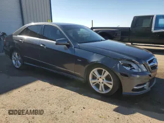2012 Mercedes-Benz E E 350 Luxury with VIN WDDHF5KB6CA556508, listed as a Copart auction lot 79242984 with 164,085 mi miles and Salvage Title. Bid and sale history available at carsss.com. Image 4.