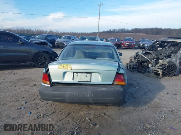 1997 Saturn SL with VIN 1G8ZH528XVZ196784, listed as a IAAI auction lot 41662187 with 112,278 mi miles. Bid and sale history available at carsss.com. Image 16.