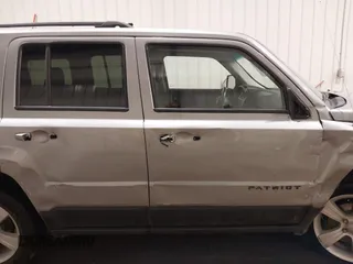 2016 Jeep Patriot Latitude with VIN 1C4NJRFB0GD581213, listed as a IAAI auction lot 42407888 with 104,202 mi miles and . Bid and sale history available at DreamBid. Image 14.