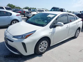 2020 Toyota Prius L Eco z VIN JTDKARFU8L3126291, wystawiony jako IAAI lot #42190242 z przebiegiem 60 404 mil mil oraz . Historia ofert i sprzedaży dostępna na DreamBid. Obrazek 2.