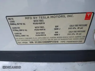 2013 Tesla Model S with VIN 5YJSA1CN2DFP17316, listed as a IAAI auction lot 42092751 with 1 mi miles. Bid and sale history available at carsss.com. Image 9.