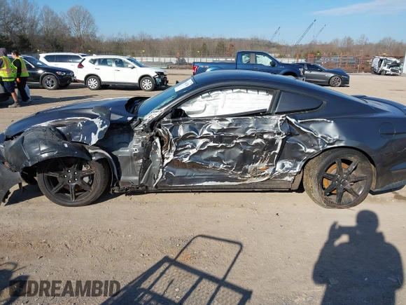 2018 Ford Mustang GT z VIN 1FA6P8CF4J5158775, wystawiony jako IAAI lot #41627780 z przebiegiem 65 519 mil mil oraz . Historia ofert i sprzedaży dostępna na DreamBid. Obrazek 14.