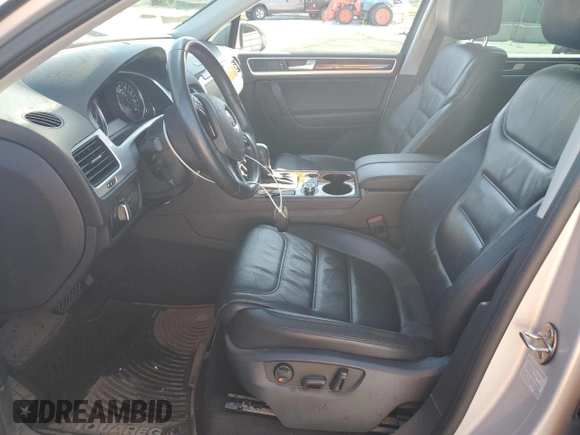 2014 Volkswagen Touareg Lux with VIN WVGEF9BP1ED012267, listed as a Copart auction lot 58924055 with 81,009 mi miles and Salvage title. Bid and sale history available at DreamBid. Image 7.