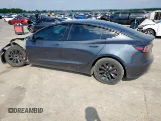 2021 Tesla Model 3 Standard Range Plus z VIN 5YJ3E1EA6MF082796, wystawiony jako Copart lot #53110955 z przebiegiem 92 009 mil mil oraz Szkoda całkowita • Salvage title. Historia ofert i sprzedaży dostępna na DreamBid. Obrazek 2.