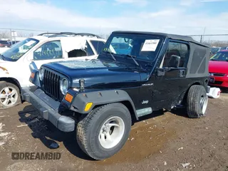2002 Jeep Wrangler X with VIN 1J4FA39S52P770664, listed as a IAAI auction lot 41661580 with 122,445 mi miles. Bid and sale history available at carsss.com. Image 17.