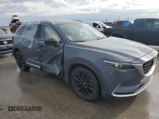 2021 Mazda CX-9 Grand Touring z VIN JM3TCADYXM0519757, wystawiony jako Copart lot #86665134 z przebiegiem 51 217 mil mil oraz Szkoda całkowita • Salvage title. Historia ofert i sprzedaży dostępna na DreamBid. Obrazek 4.