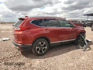 2018 Honda CR-V Touring with VIN 2HKRW2H9XJH670518, listed as a Copart auction lot 48620765 with 61,016 mi miles and Salvage Title. Bid and sale history available at carsss.com. Image 3.