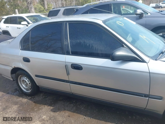 1996 Honda Civic DX with VIN 2HGEJ6627TH550103, listed as a IAAI auction lot 41710877 with 142,608 mi miles. Bid and sale history available at carsss.com. Image 13.