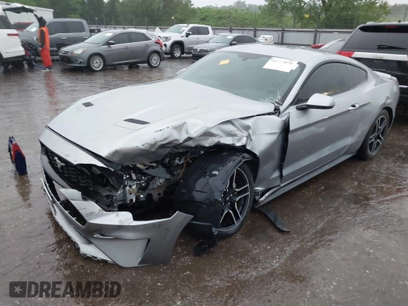 2020 Ford Mustang EcoBoost with VIN 1FA6P8TH3L5111659, listed as a IAAI auction lot 42115879 with 93,928 mi miles and . Bid and sale history available at DreamBid. Image 2.