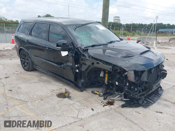 2023 Dodge Durango SRT Hellcat Premium with VIN 1C4SDJH9XPC554953, listed as a IAAI auction lot 42375728 with 19,492 mi miles and . Bid and sale history available at DreamBid. Image 1.