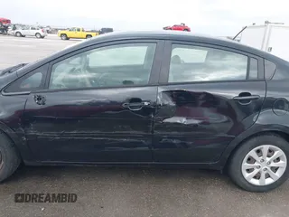 2015 Kia Rio LX with VIN KNADM4A39F6440291, listed as a IAAI auction lot 41532881 with 97,238 mi miles. Bid and sale history available at carsss.com. Image 15.