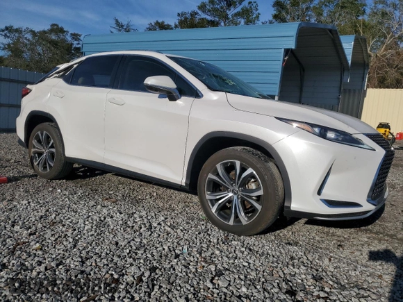 2021 Lexus RX with VIN 2T2HZMAA7MC216152, listed as a Copart auction lot 81102304 with 36,924 mi miles and Salvage Title. Bid and sale history available at carsss.com. Image 4.