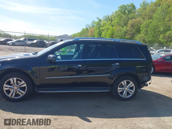 2012 Mercedes-Benz GL-Class GL 450 with VIN 4JGBF7BEXCA790393, listed as a IAAI auction lot 42082681 with 143,095 mi miles. Bid and sale history available at carsss.com. Image 15.