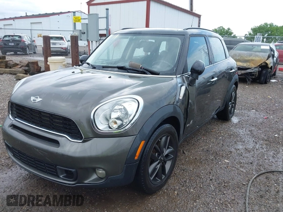 2011 MINI Countryman S with VIN WMWZC5C53BWM11022, listed as a IAAI auction lot 42249403 with 173,718 mi miles and . Bid and sale history available at DreamBid. Image 2.