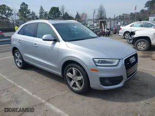 2015 Audi Q3 2.0T Premium Plus with VIN WA1EFCFS0FR006247, listed as a IAAI auction lot 41813251 with 126,042 mi miles. Bid and sale history available at carsss.com. Image 1.