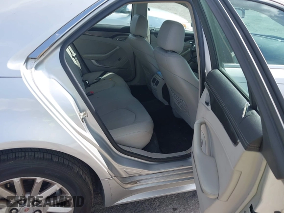 2010 Cadillac CTS with VIN 1G6DA5EG9A0128758, listed as a IAAI auction lot 41958677 with 156,088 mi miles and . Bid and sale history available at DreamBid. Image 8.