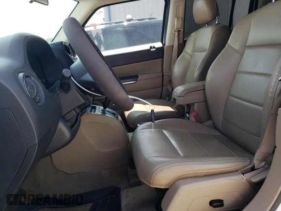2015 Jeep Patriot Limited with VIN 1C4NJRCB6FD290086, listed as a Copart auction lot 67796934 with 116,854 mi miles and Salvage title. Bid and sale history available at DreamBid. Image 7.