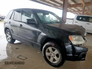 2011 Suzuki Grand Vitara Premium with VIN JS3TD0D28B4102365, listed as a Copart auction lot 60560495 with 176,190 mi miles and Salvage title. Bid and sale history available at DreamBid. Image 4.