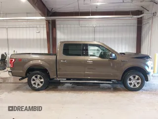 2015 Ford F-150 XLT with VIN 1FTEW1EFXFFB14990, listed as a IAAI auction lot 41681520 with 121,255 mi miles. Bid and sale history available at carsss.com. Image 14.