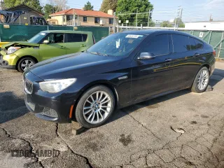2014 BMW 5 Series 535i xDrive with VIN WBA5M4C59ED183677, listed as a Copart auction lot 65634735 with 140,717 mi miles and Clean title. Bid and sale history available at DreamBid. Image 1.