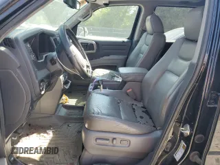 2013 Honda Ridgeline RTL with VIN 5FPYK1F58DB018136, listed as a Copart auction lot 61720925 with 184,020 mi miles and Salvage title. Bid and sale history available at DreamBid. Image 7.